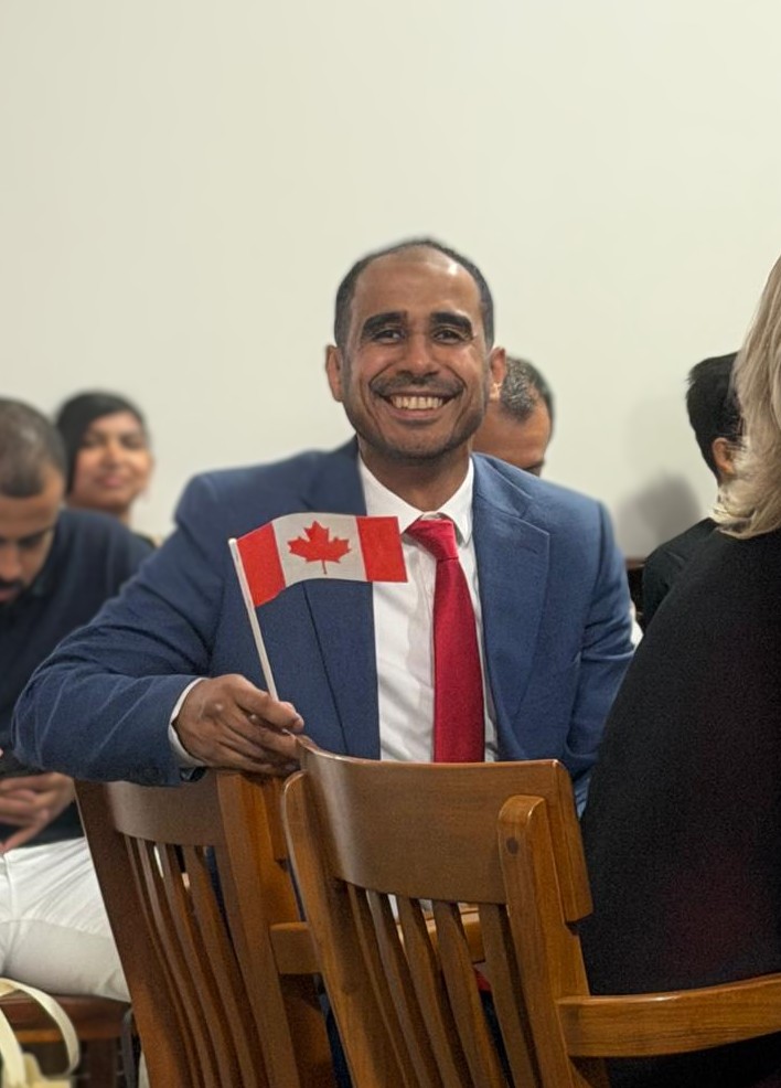 Mohamed Askalany speaking at a podium